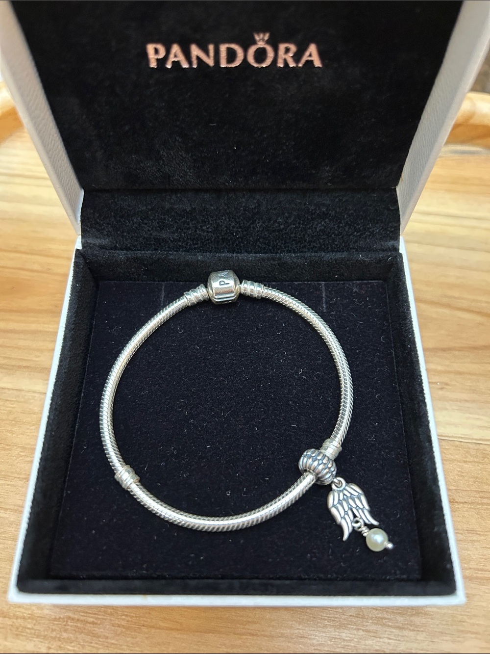 Brand New Pandora Silver Bracelet with Angel Wing and Pearl Drop Charm